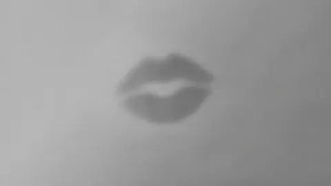 Blurred Lips on Gray
