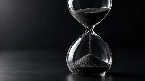 Glass Hourglass With Dark Sand