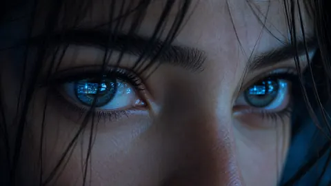 Woman's Eyes With Monitor Reflections