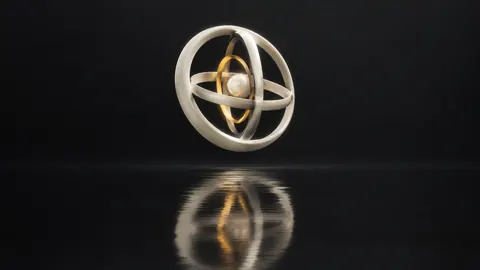 Ivory Gyroscope Reflection