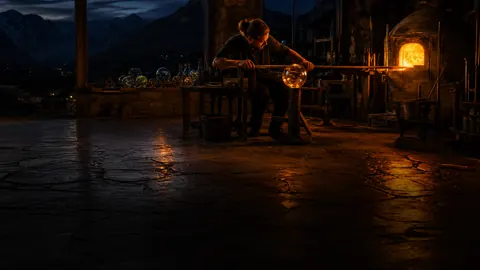 Glassblower With Amber Sphere
