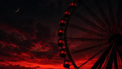 Ferris Wheel Under Crimson Moon